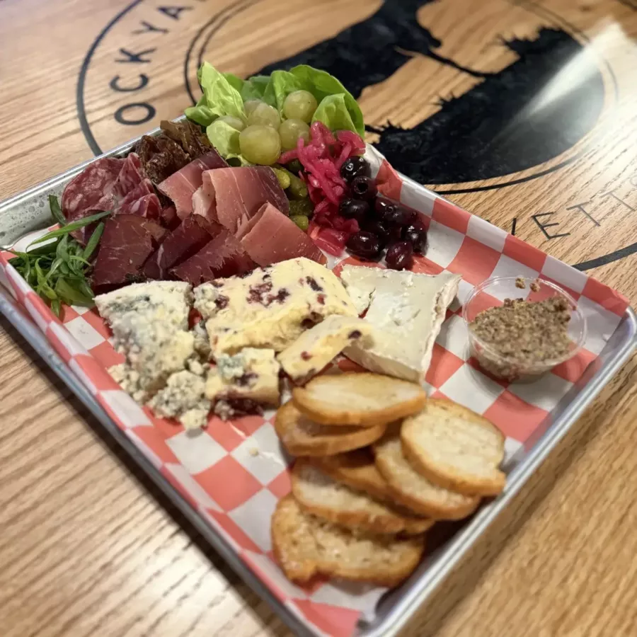 Charcuterie board with local cheeses